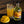 Load image into Gallery viewer, Mango Gin Liqueur 500ml displayed on grey slate next to mango cocktail with fresh mango garnish. Mango Gin Liqueur, fruit gin liqueur by Newy Distillery.
